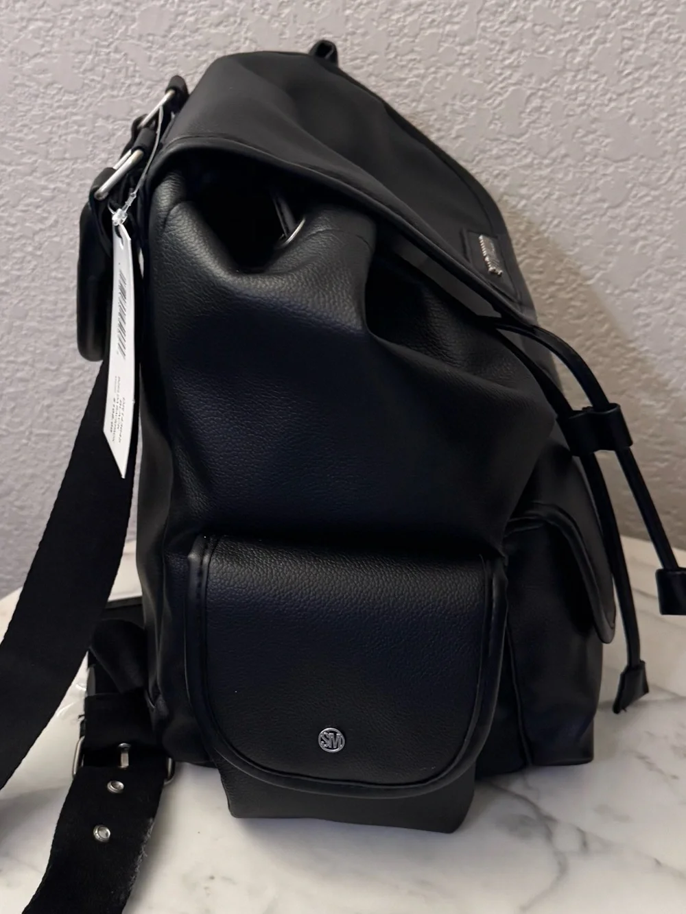 Steve Madden Black Backpack,ruck sack style drawn string,magnetic closure,Bzelda